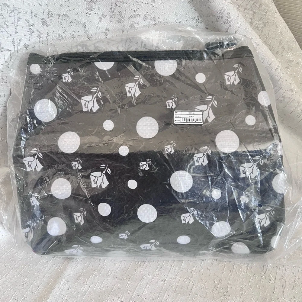 Black and White Polka Dot Cosmetic Bag with Skull Accents